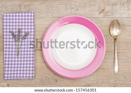 Cover with flowers of lavender on a wooden table