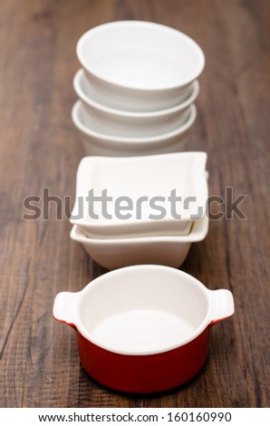Different porcelain bowls in vertical format