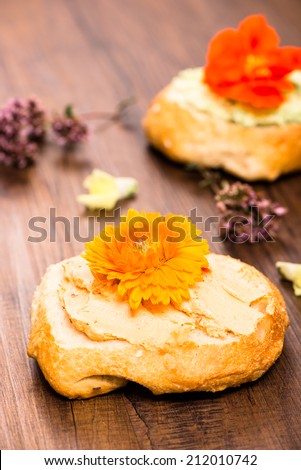 Rolls with farmer cheese and edible flowers