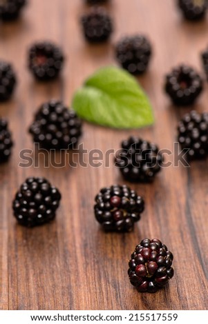 Blackberries in vertical format in the backlit