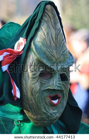 COLOGNE - CIRCA FEB 2008 : Participant parades as cabbage man at the traditional carnival parade circa February 2008 in Cologne, Germany.