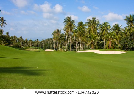 Landscape of a beautiful green golf course with sky. Island Koh Samui, Thailand.