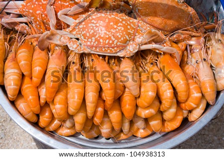 Cooked crabs and shrimps on the market of Thailand