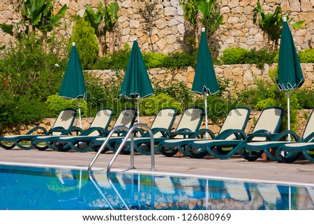 Chaise lounges by the swimming pool in Turkey