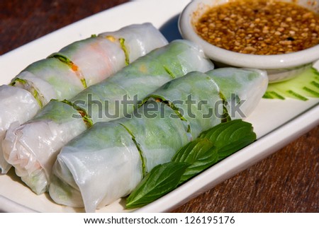 Chinese spring rolls with vegetable on the plate