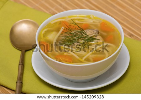 Chicken soup with noodle and vegetables