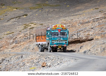 LADAKH, INDIA - SEPTEMBER 09 2014: Truck on the high altitude Manali-Leh road in Lahaul valley, state of Himachal Pradesh, Indian Himalayas, India