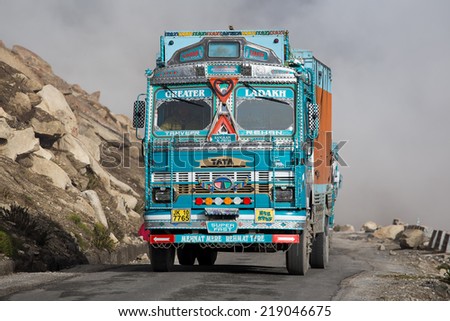 LADAKH, INDIA - SEPTEMBER 07 2014: Truck on the high altitude Manali-Leh road in Lahaul valley, state of Himachal Pradesh, Indian Himalayas, India
