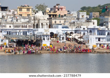 PUSHKAR, INDIA - OCTOBER 26, 2014: Holy ghats at sacred Sarovar lake. Pushkar - famous worship place in India