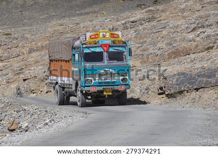LADAKH, INDIA - SEPTEMBER 09, 2014: Truck on the high altitude Manali-Leh road in Lahaul valley, state of Himachal Pradesh, Indian Himalayas, India