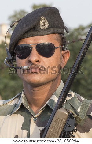 ATTARI, INDIA - SEPTEMBER 29, 2014: Unknown Indian frontier guard at the Indian - Pakistani border during the border closing ceremony