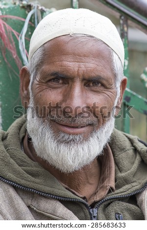 SRINAGAR, INDIA - JUNE 07, 2015: Unidentified Indian muslim man in the market. Kashmiris are fighting for their freedom for 20 years. Kashmir became dangerous again.