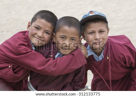 LEH, INDIA - JUNE 24, 2015: Unidentified Tibetan students in a lesson on Sport in Druk White Lotus School