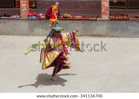 LAMAYURU, INDIA - JUNE 13, 2015: An unidentified buddhist lamas dressed in mystical mask dancing Tsam mystery dance in time of Yuru Kabgyat Buddhist festival at Lamayuru Gompa, Ladakh, North India