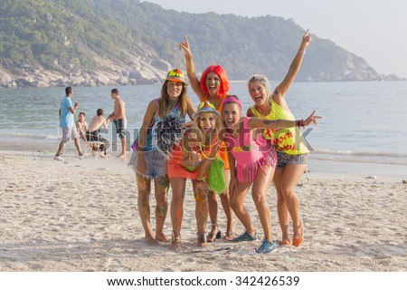 PHANGAN, THAILAND - JANUARY 5, 2015 :Unidentified people participate in the Full Moon party on island Koh Phangan. The event now attracts anywhere from 40,000 party-goers on a normal month