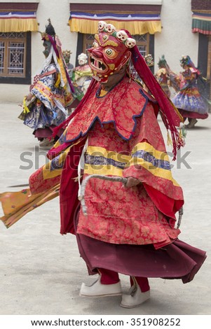 LAMAYURU, INDIA - JUNE 13, 2015: An unidentified buddhist lamas dressed in mystical mask dancing Tsam mystery dance in time of Yuru Kabgyat Buddhist festival at Lamayuru Gompa, Ladakh, North India