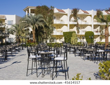 Table and chairs in empty cafe. Hurghada city in Egypt.