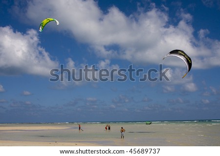 SAMUI, THAILAND - JANUARY 24:Kite-surfers prepare to  compete in kite-surfing event at Bang Kao on January 24, 2010 in Samui, Thailand.