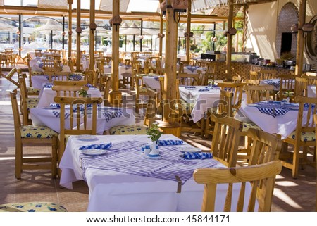 Table and chairs in empty cafe. Hurghada city in Egypt.
