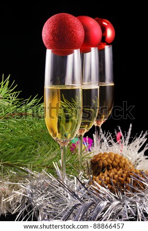 Champagne glass with christmas tree and pinecone