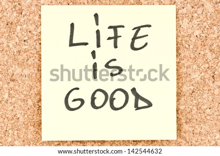 Life is Good, handwritten on a sticky note
