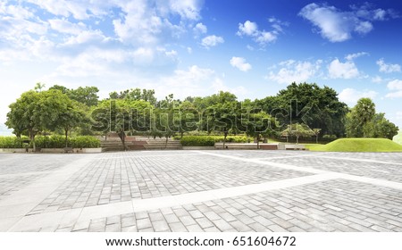 Empty street at the nice and comfortable garden background with nice blue sky
