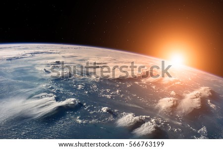 Close view of planet Earth from space during a sunrise. Elements of this image furnished by NASA.
