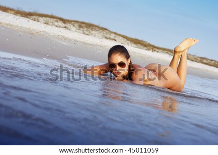 stock photo naked girl on the beach