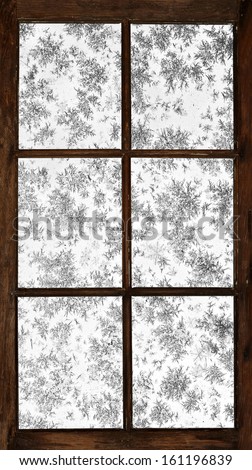 Old grunge wooden window, frosted over.