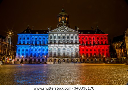 Dam square light decorations as french flag colors for praying for france on 17 November 2015