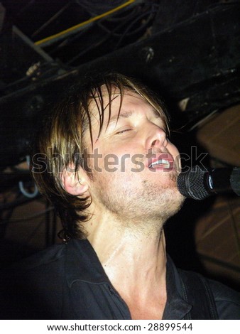 Chicago, IL - March 30: Country singer Keith Urban performs a No Frills show at Joe\'s Bar March 30, 2009 in Chicago, IL. The No Frills show was one of five shows performed and sponsored by Verizon.