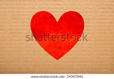 red velvet hole in brown cardboard background