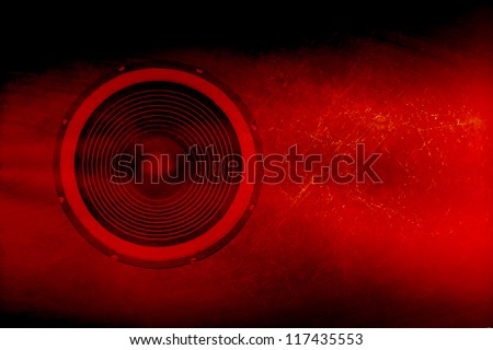 Audio speaker on a red grunge background
