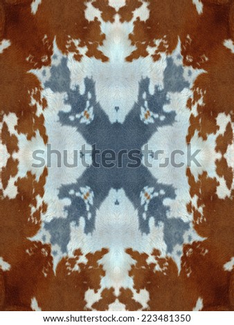 Brown and white kaleidoscope cow hide pattern