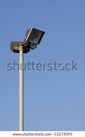 Security light against a blue sky