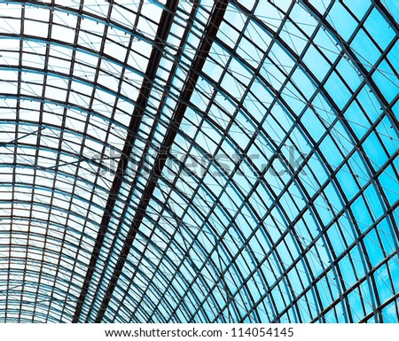 abstract blue glass ceiling inside shopping mall