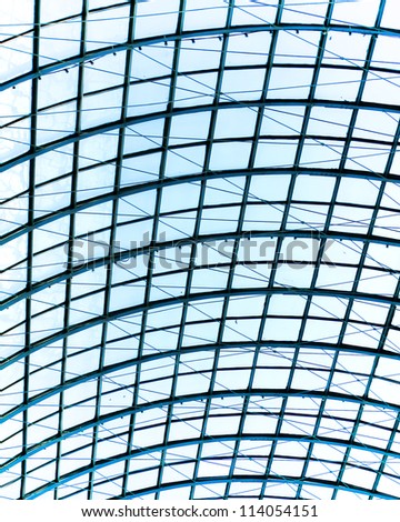 abstract blue glass ceiling inside shopping mall