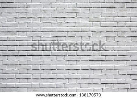 Grungy textured white horizontal stone and brick paint architecture wall inside old neglected and deserted interior, masonry and carpentry brickwork concept