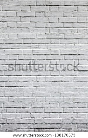 Grungy textured white vertical stone and brick paint architecture wall inside old neglected and deserted interior, masonry and carpentry brickwork concept