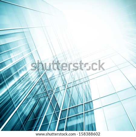 Panoramic And Perspective Wide Angle View To Steel Blue Background Of Glass High Rise Building Skyscrapers In Modern Futuristic Downtown At Night Business Concept Of Successful Industrial Architecture