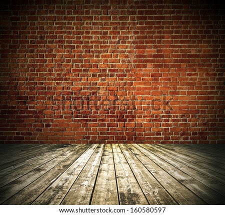 Grungy Textured Red Brick And Stone Wall With Warm Brown Wooden Floor Inside Old Neglected And Deserted Interior, Masonry And Carpentry Brickwork Concept