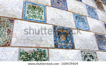 Ceramic mosaic Park Guell in Barcelona, Spain. Park Guell is the famous architectural town art designed by Antoni Gaudi and built in the years 1900 to 1914