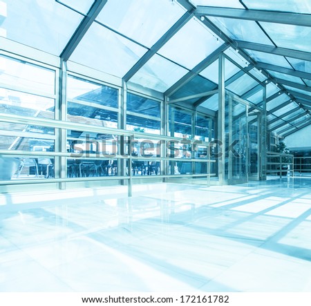 Underside Wide Angled And Perspective View To Steel Blue Glass Airport Ceiling Through High Rise Building Skyscrapers, Business Concept Of Successful Industrial Architecture