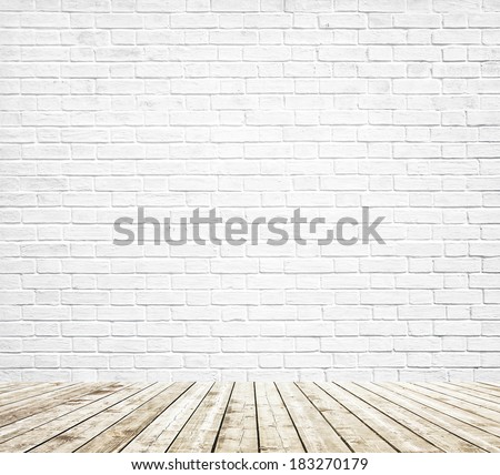 Background of age grungy white texture of paint stucco brick and stone wall with light wooden floor inside old modern and contemporary empty interior, blank color horizontal space of clean studio room