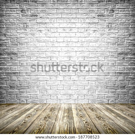 Background of age grungy black, white texture of paint stucco brick and stone wall with dark wood floor in old modern and contemporary empty interior, blank color horizontal space of clean studio room