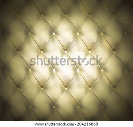 Abstract art used skin background texture of old natural luxury modern style rhombs leather Classic light brown and dark yellow grungy decor retro wall, door, sofa, studio interior with metal buttons