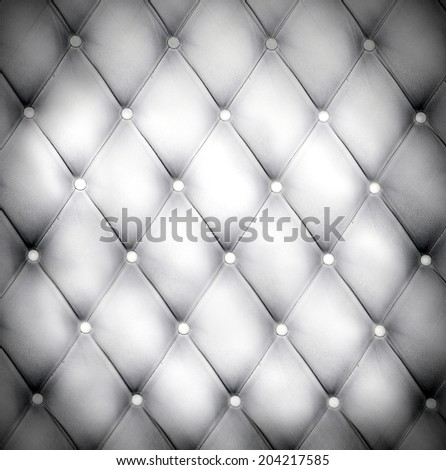 Abstract art used skin background texture of old natural luxury modern style rhombs leather. Classic light blue and dark gray grungy decor retro wall, door, sofa, studio interior with metal buttons.