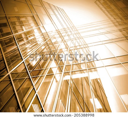 Panoramic and perspective wide angle view to steel light bronzed background of glass high rise building skyscraper commercial modern city of future Business concept of successful industry architecture