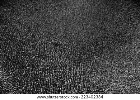 Perspective and closeup view to abstract dark space of empty black natural clean leather texture for the traditional business background in luxury grunge color