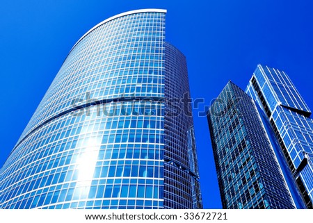 Modern skyscraper business center on blue sky background